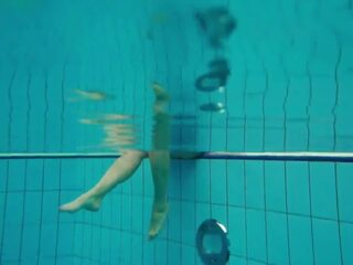 Captivating brunette Deniska underwater